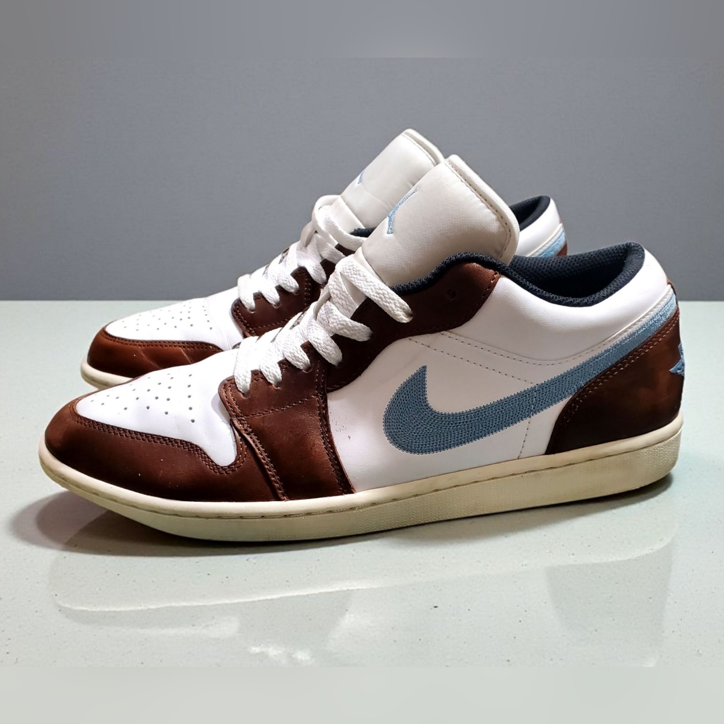 Jordan 1 Low Brown And White With Embroidered Blue Swoosh